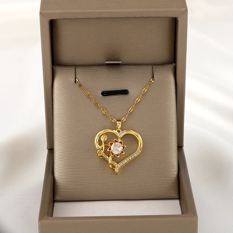 Collar Colgante con Corazón y Flor Giratoria Anti-Estrés