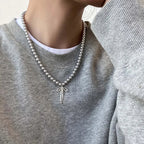 Collar con Colgante de Perlas Grises y Lazo