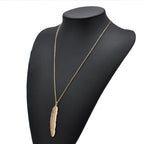 Collar con colgante de pluma para mujer en oro