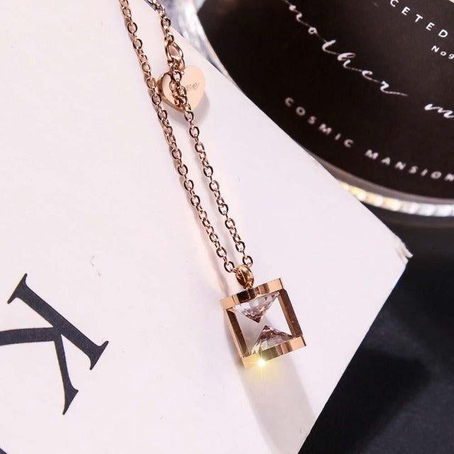 Collar Reloj de Arena Corazón Colgante