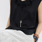 Long collier en corde avec pendentif clef