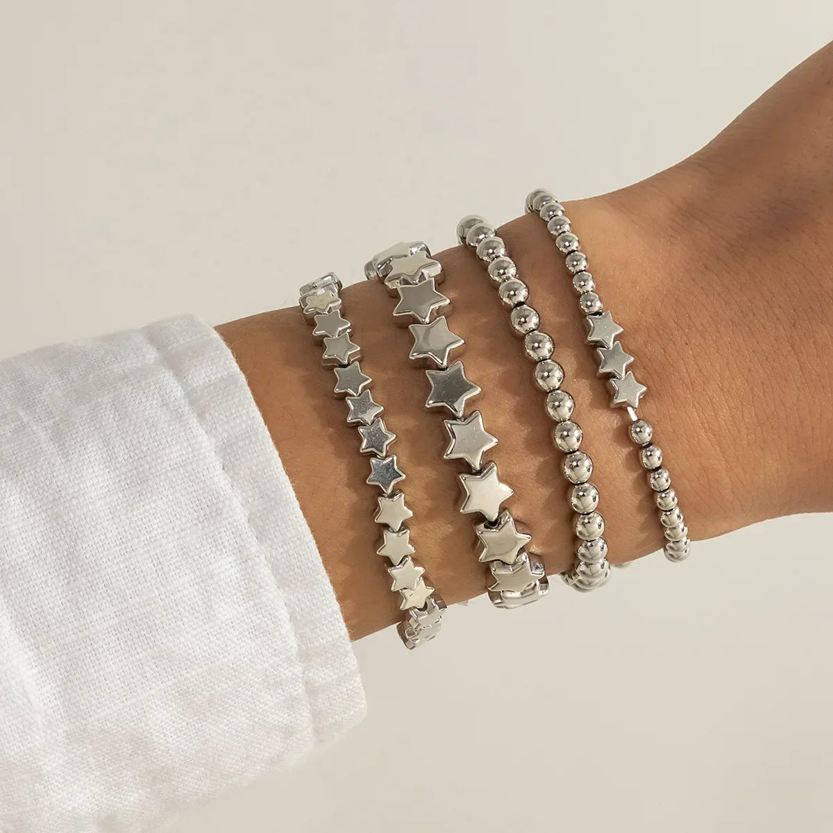 Lote de 4 Pulseras Estrellas plata