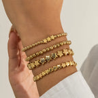 Lote de 4 Pulseras Estrellas oro